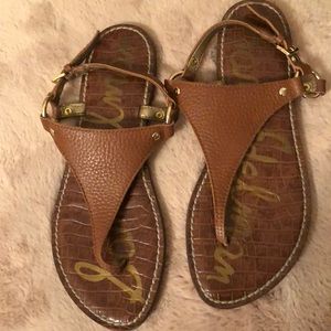 Natural leather thong sandals.